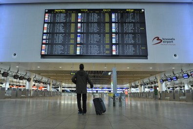 **FILE**A passenger looks at flight information board showing all departing flights cancelled at Brussels Airport in Zaventem during a national general strike of Belgium, Dec. 15 2014. (Xinhua/Ye Pingfan)/CHINENOUVELLE_2203.BEL.005/Credit:CHINE NOUVELLE/SIPA/1603221208